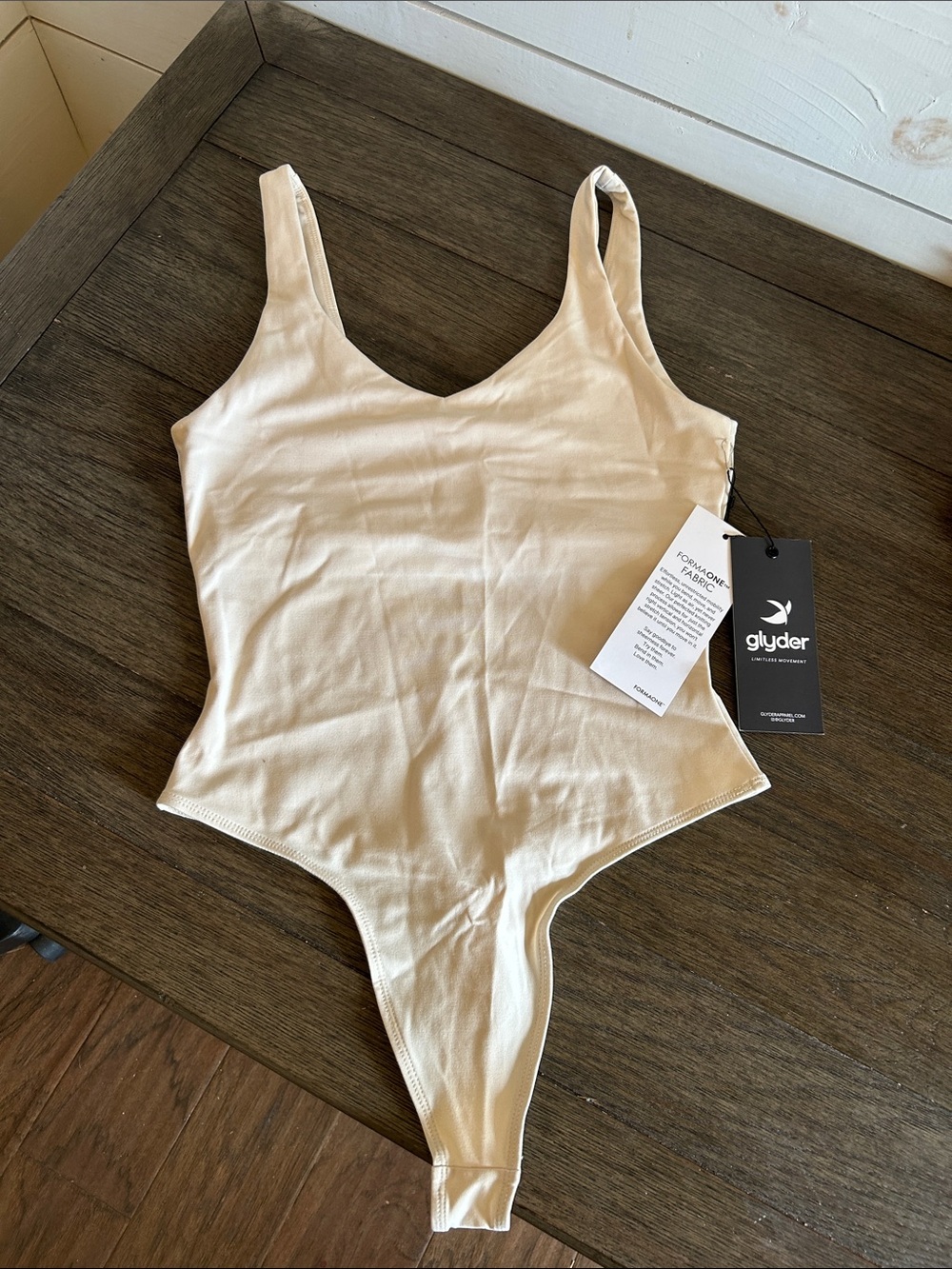 Glyder women’s Cream/Taupe One-Piece Bodysuit